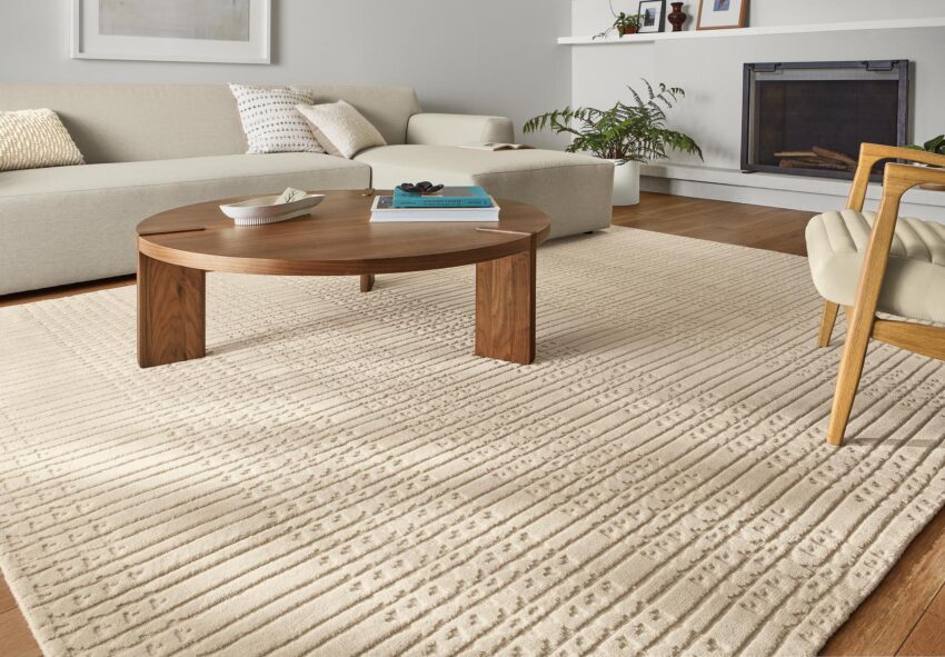 Living room with Bria 8x10 rug and Hanover walnut coffee table.