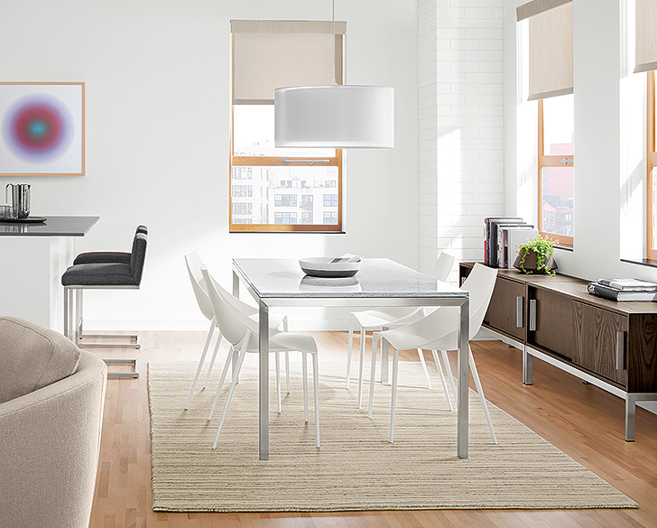 Portica table with stainless steel base and white top