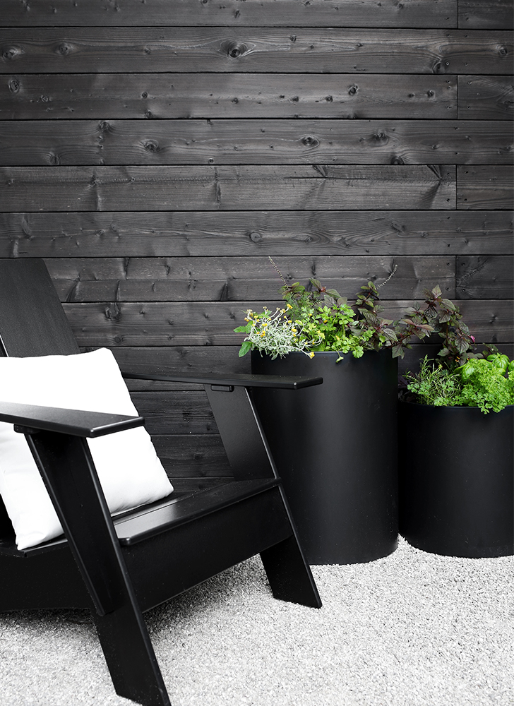 Close up of planters in backyard makeover