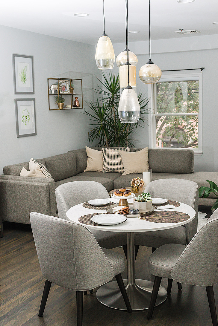 Living and dining room with Cade sofa, Aria table and Cora chairs