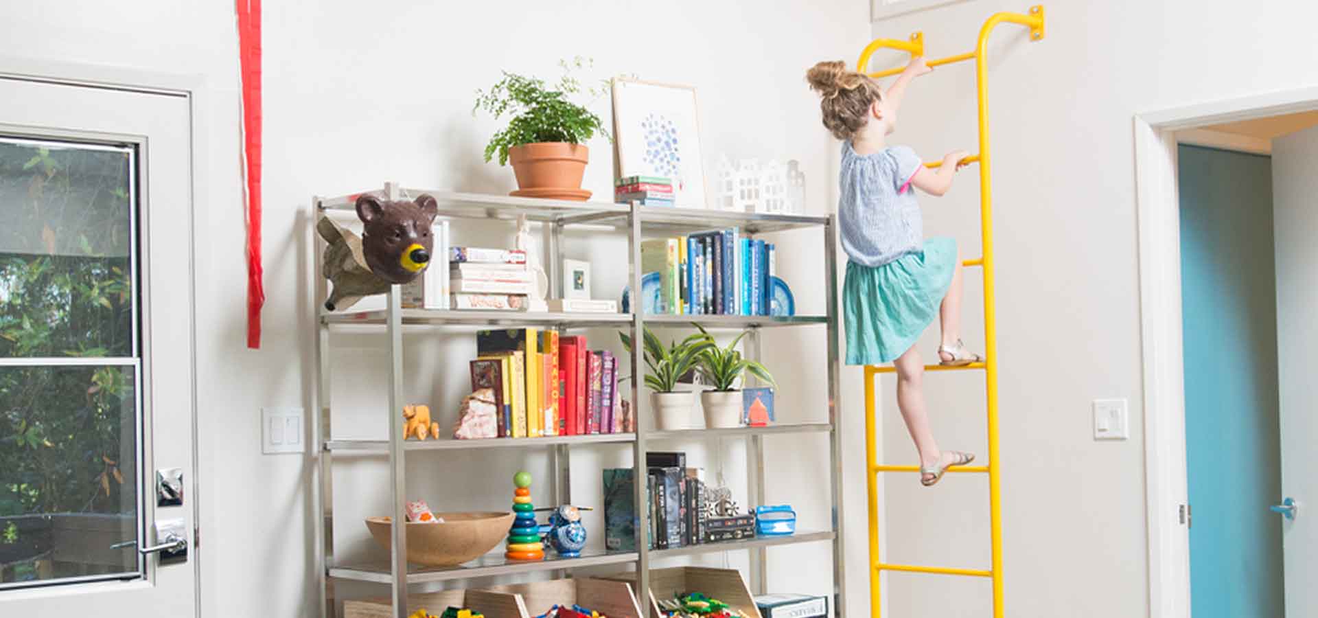 Stainless steel bookshelf in family room