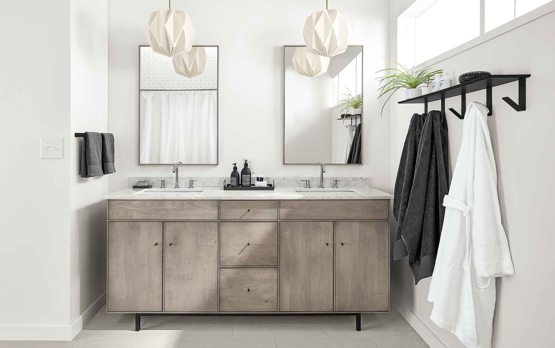 Modern bathroom with Hudson double vanity and Orikata pendants