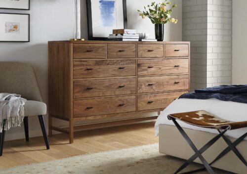 Berkeley walnut dresser in a modern bedroom.