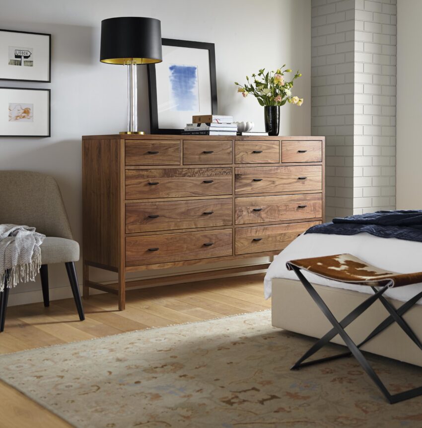 Berkeley walnut dresser in a modern bedroom.