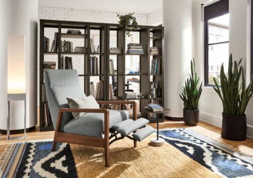 room setting including westport recliner, woodwind bookcases, parsons table and finora office chair.