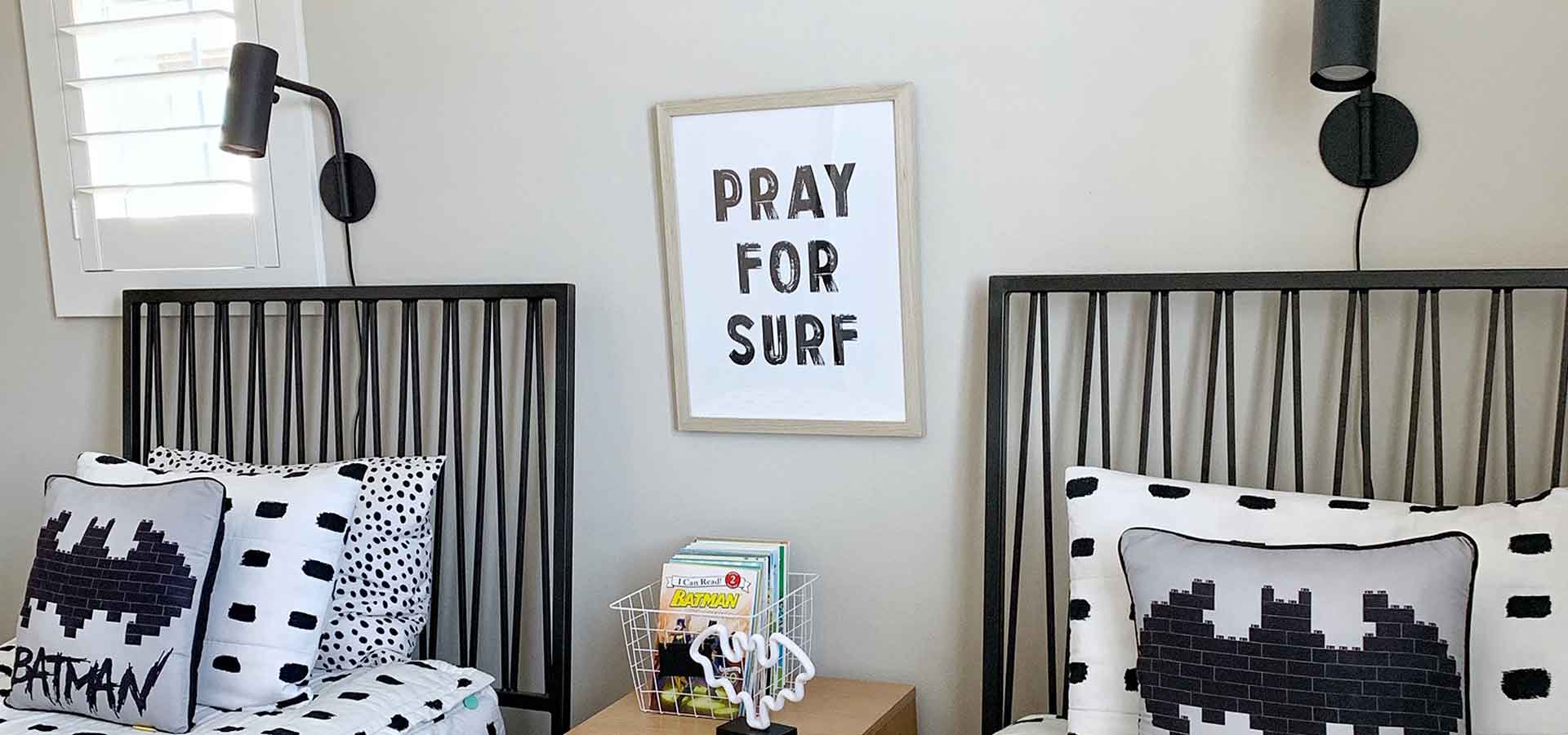 Kids room with two twin beds and one nightstand