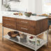 Kitchen with Booker kitchen island with shelves in walnut.