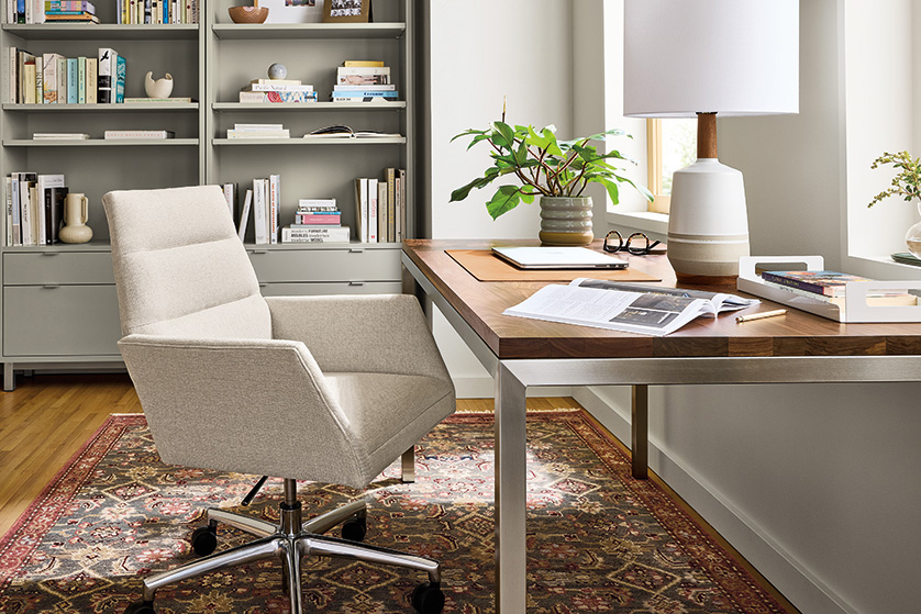 Home office with Parsons desk in stainless with walnut top, Tenley office chair in Gino oatmeal and Helena rug in slate.