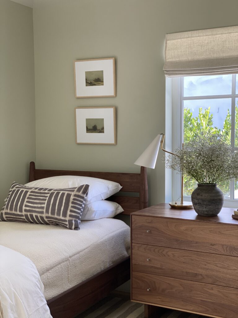 Grove twin bed and dresser in bedroom.