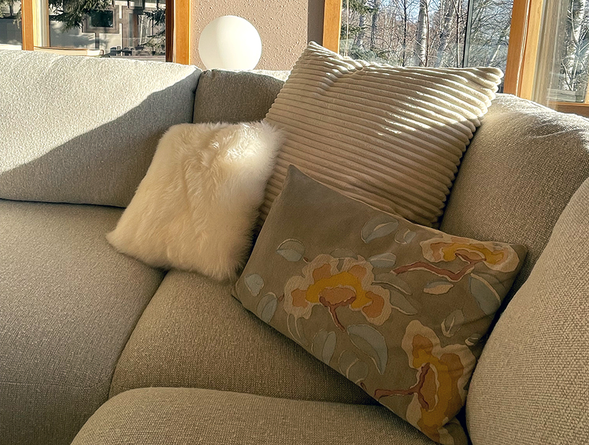 Group of three pillows in corner of Fia sofa