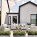 Oasis sofa and chairs in front of modern farmhouse.